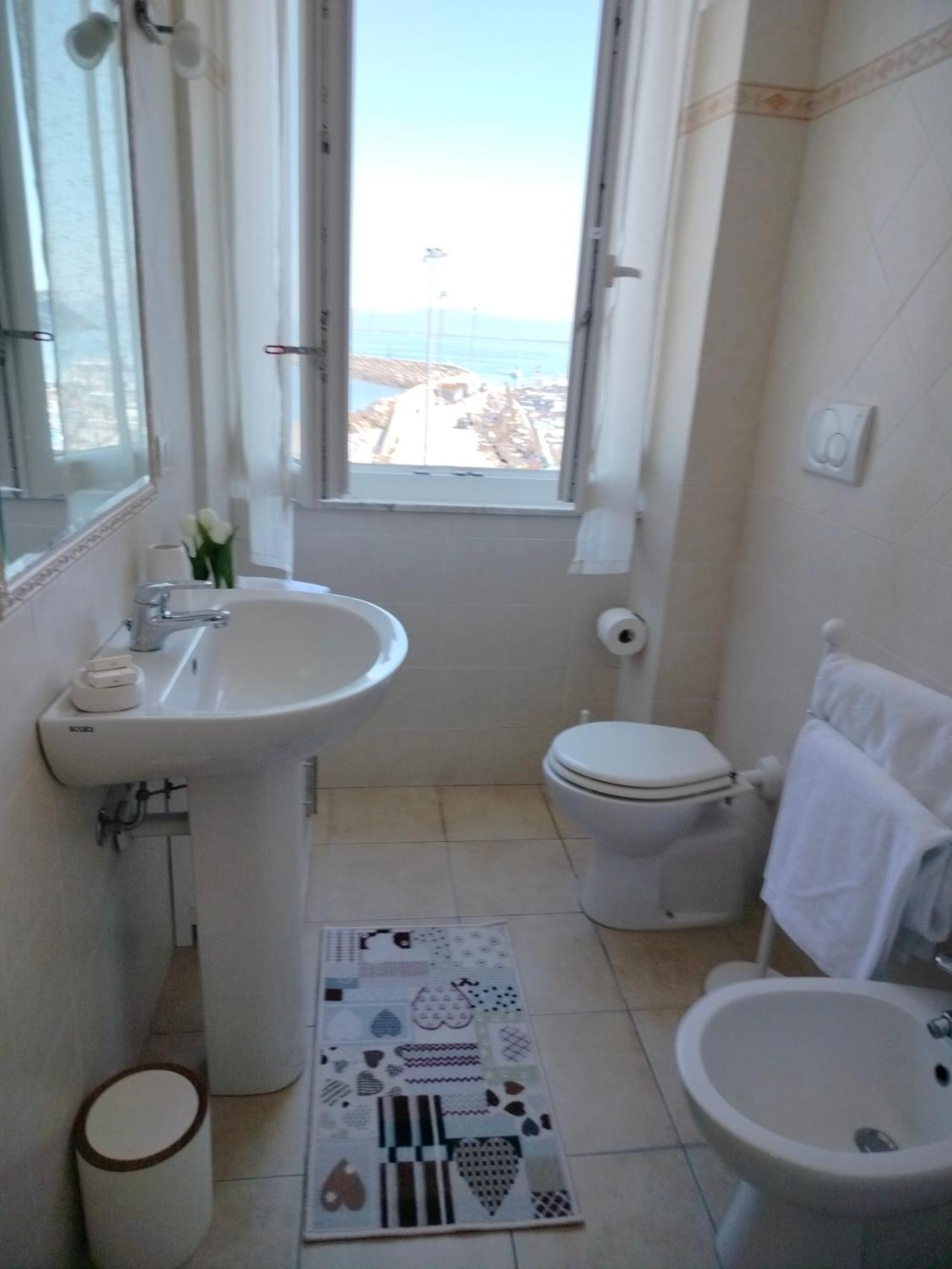 Апартаменты Casa La Marinella Sul Porto Порто Санто Стефано Экстерьер фото